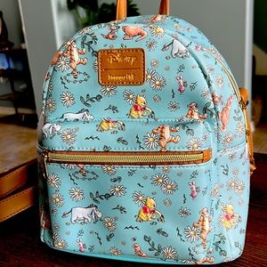 Winnie the Pooh Loungfly backpack.